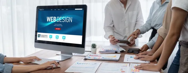 Stock image of team working on web design